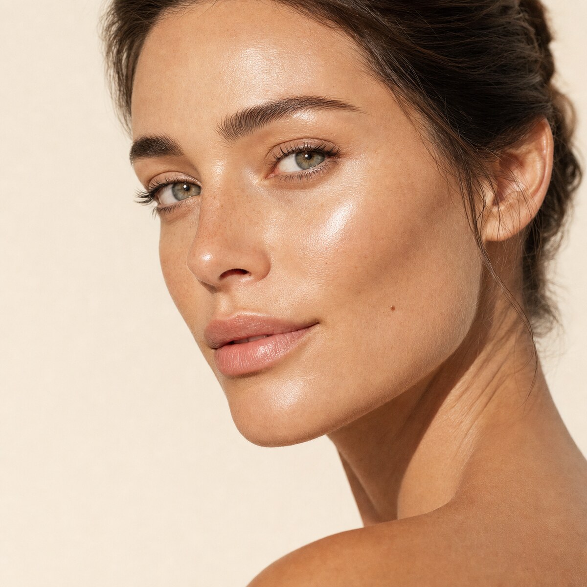 Portrait of a woman in her mid thirties with naturally balanced lips and visible skin texture